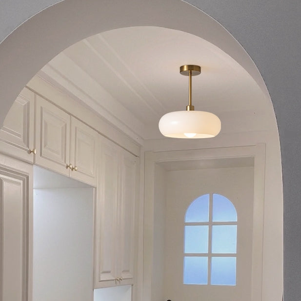 AmberSphere: Modern Round Ceiling Light with Warm Glass Shade