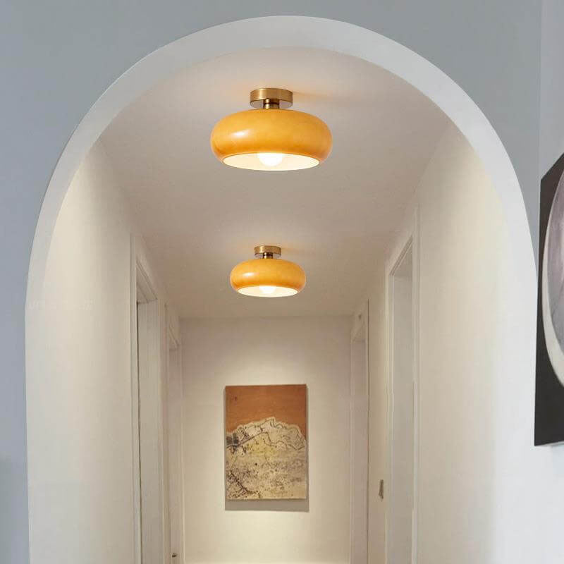 AmberSphere: Modern Round Ceiling Light with Warm Glass Shade