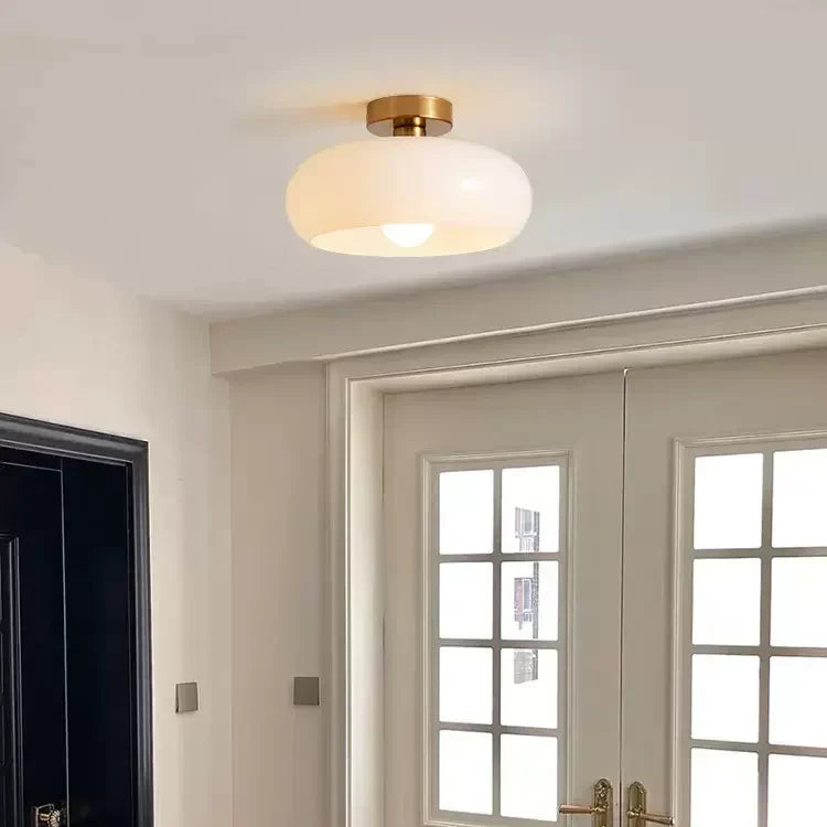 AmberSphere: Modern Round Ceiling Light with Warm Glass Shade
