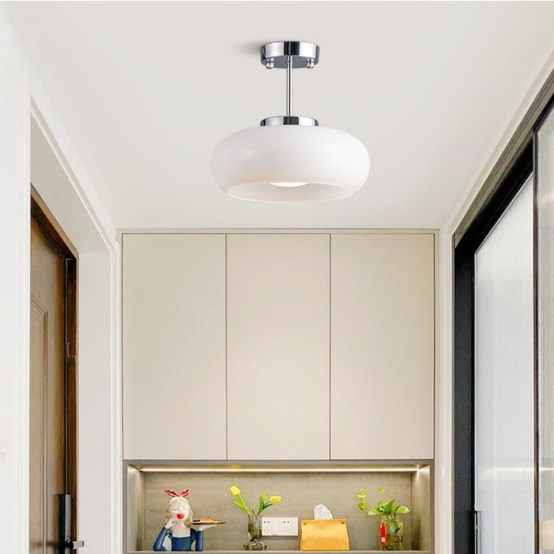 AmberSphere: Modern Round Ceiling Light with Warm Glass Shade