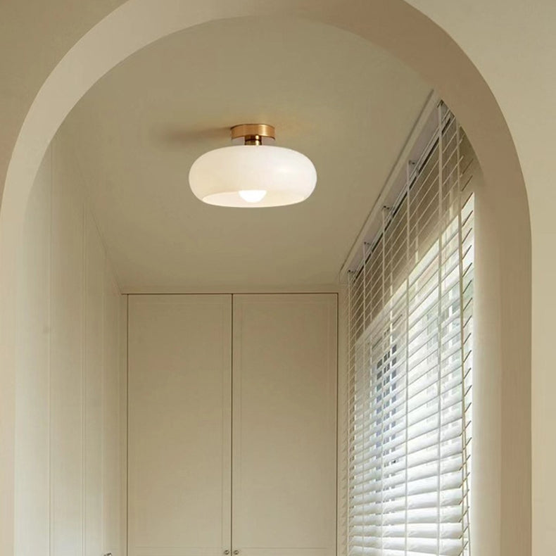 AmberSphere: Modern Round Ceiling Light with Warm Glass Shade