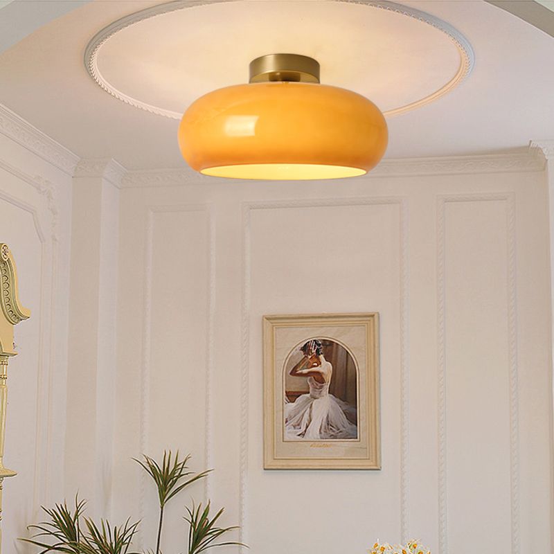 AmberSphere: Modern Round Ceiling Light with Warm Glass Shade