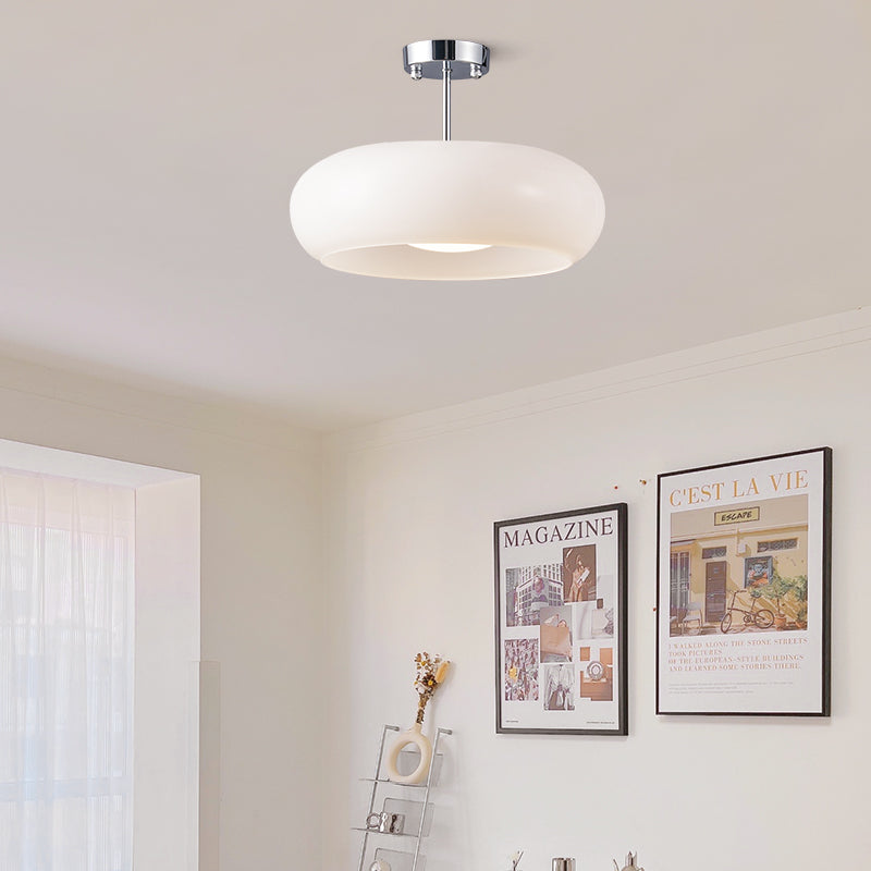 AmberSphere: Modern Round Ceiling Light with Warm Glass Shade